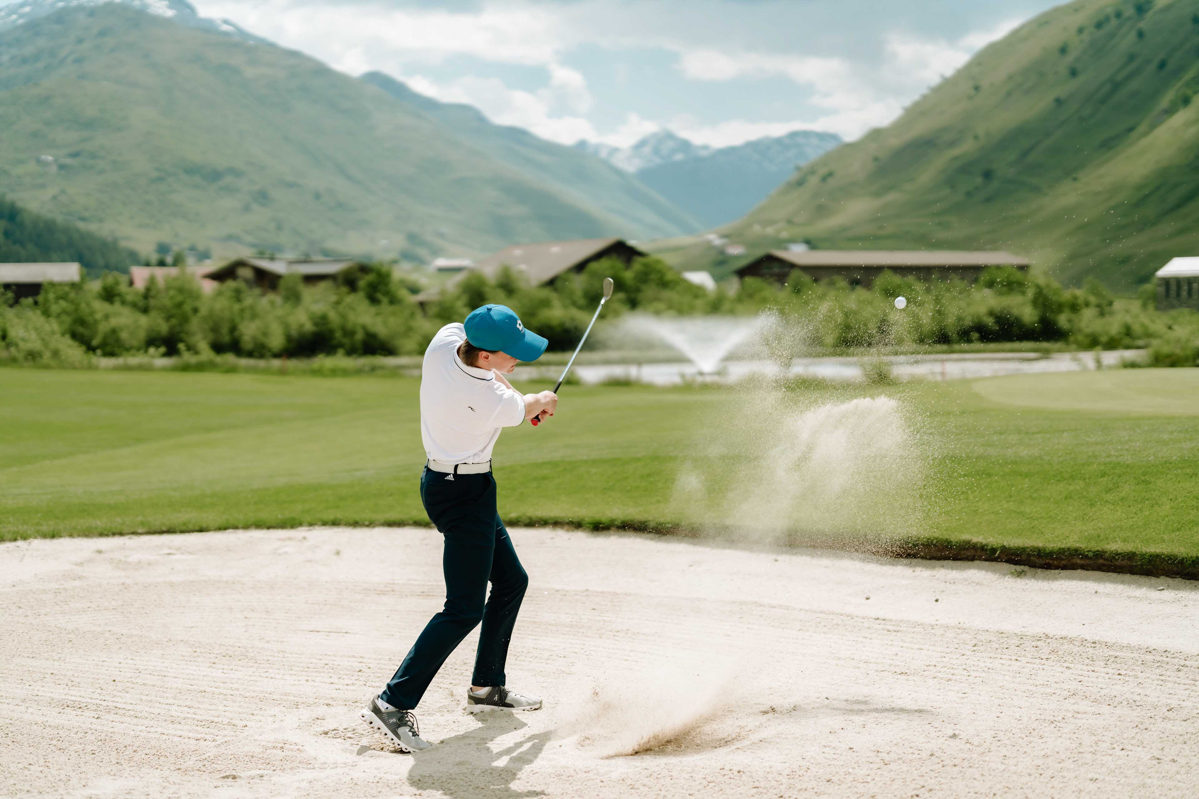 Golfer on the Golf Course Andermatt in Switzerland