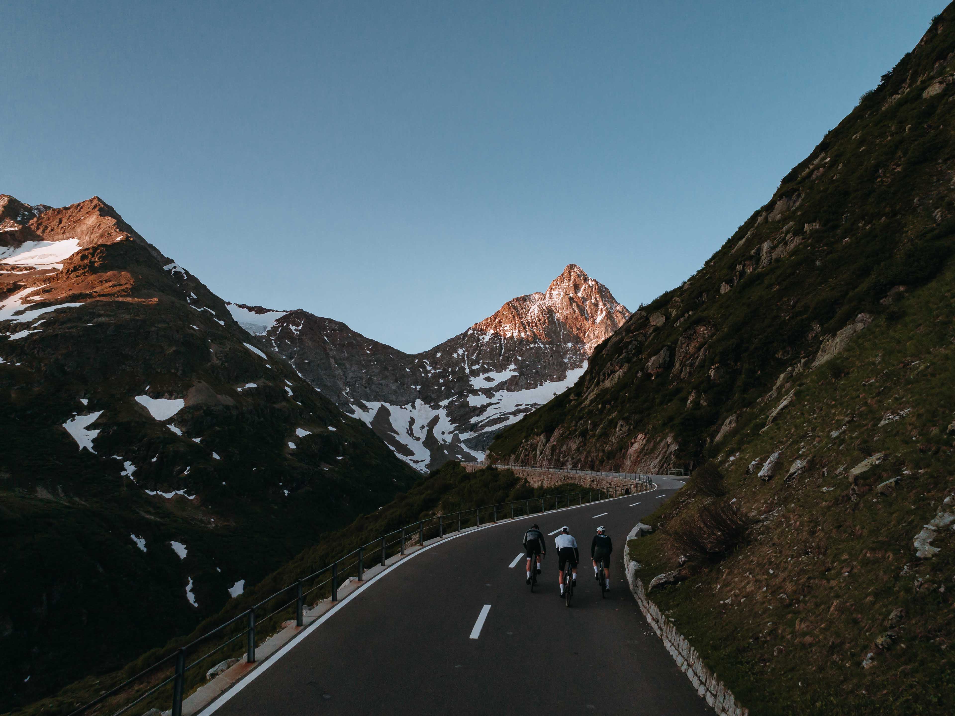 Cycling during sunrise on the Sustenpass, Switzerland